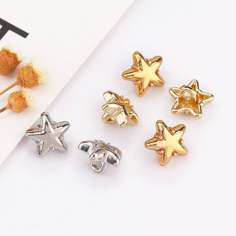 Metal star shank buttons in gold and silver tones, mixed front views