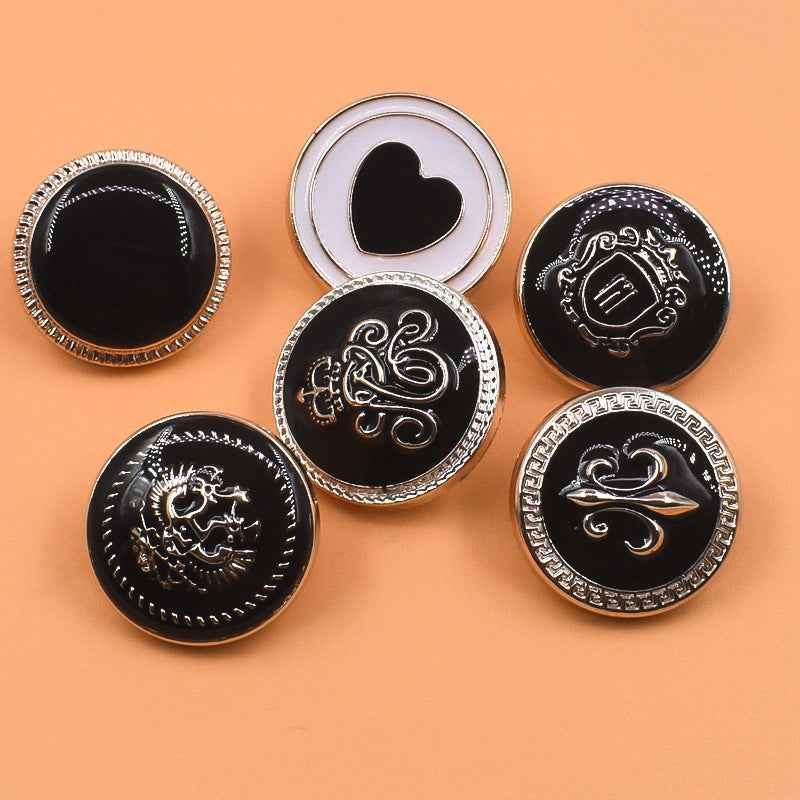 Black 21/23mm plastic shank buttons with silver rim and decorative front designs, 60 pack