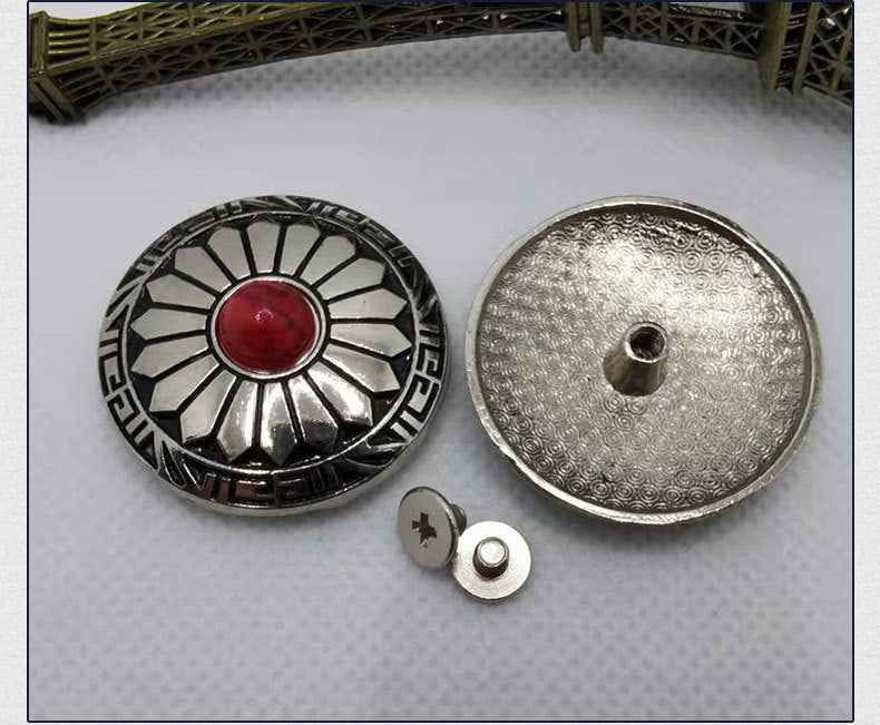 Red cabochon round alloy button with black sunburst design; metal back piece shown