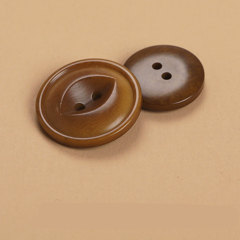 Coffee brown round 2-hole buttons, two-piece close-up
