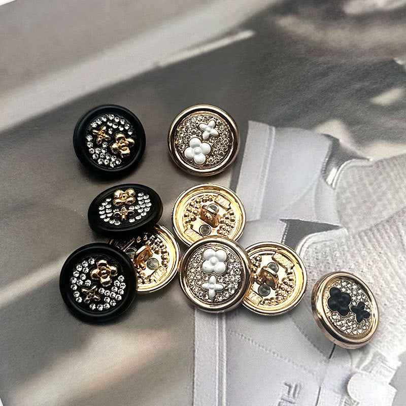 Round two-tone metal shank buttons, black faces with gold edging, floral cluster, 10 pcs