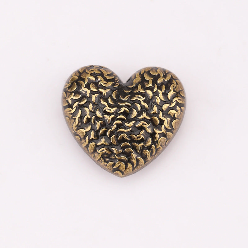 Heart-shaped textured metal shank button, antique gold with scale pattern