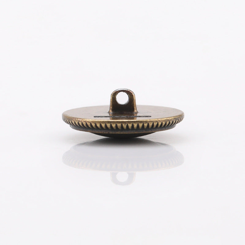 Round metal shank button underside with loop, antique bronze tone
