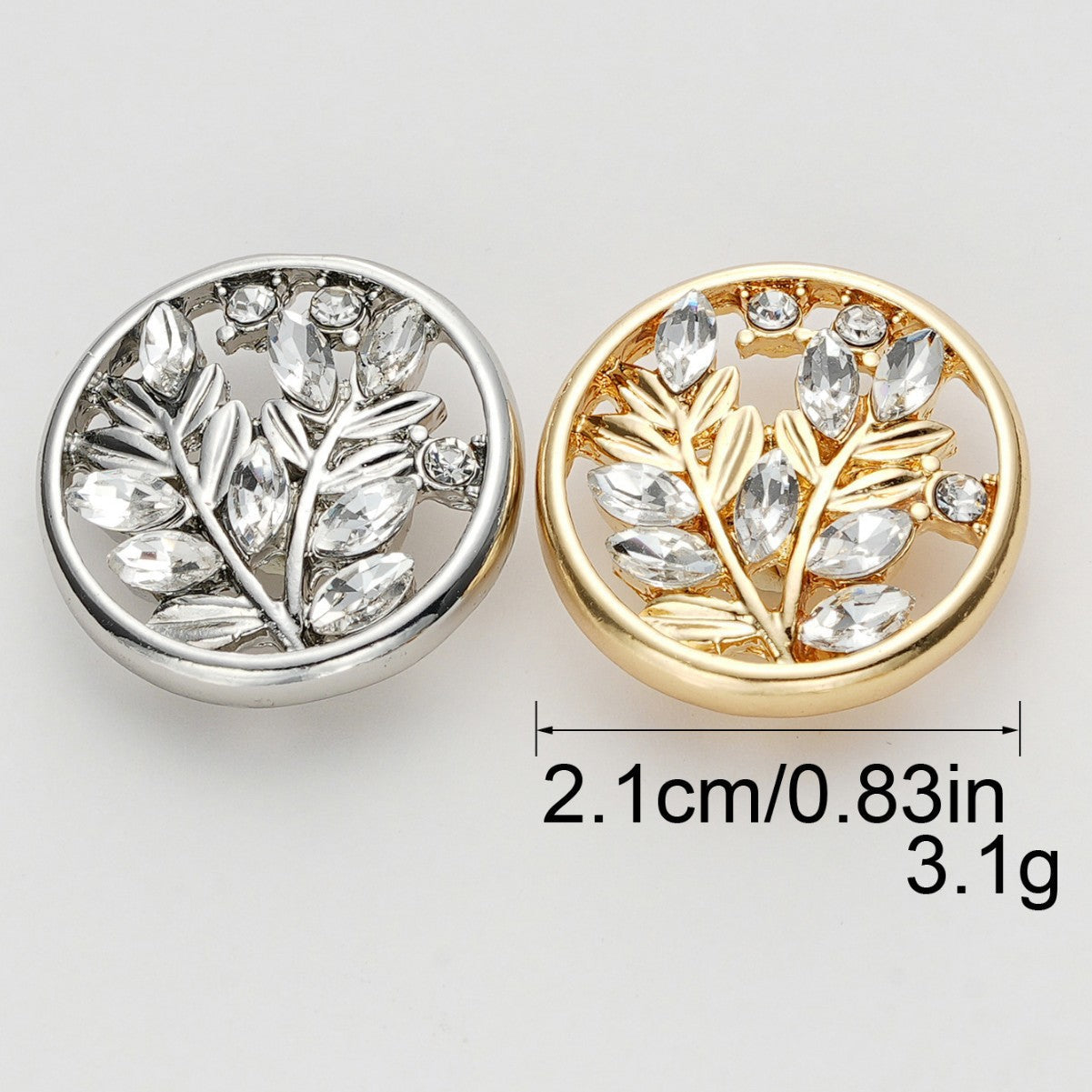 Two round crystal flower metal shank buttons, silver and gold finishes, 21 mm