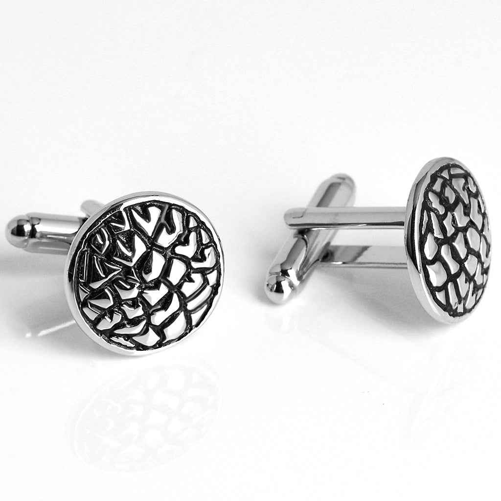 Vintage black oil-rubbed round men's cufflinks with swirling textured enamel pattern