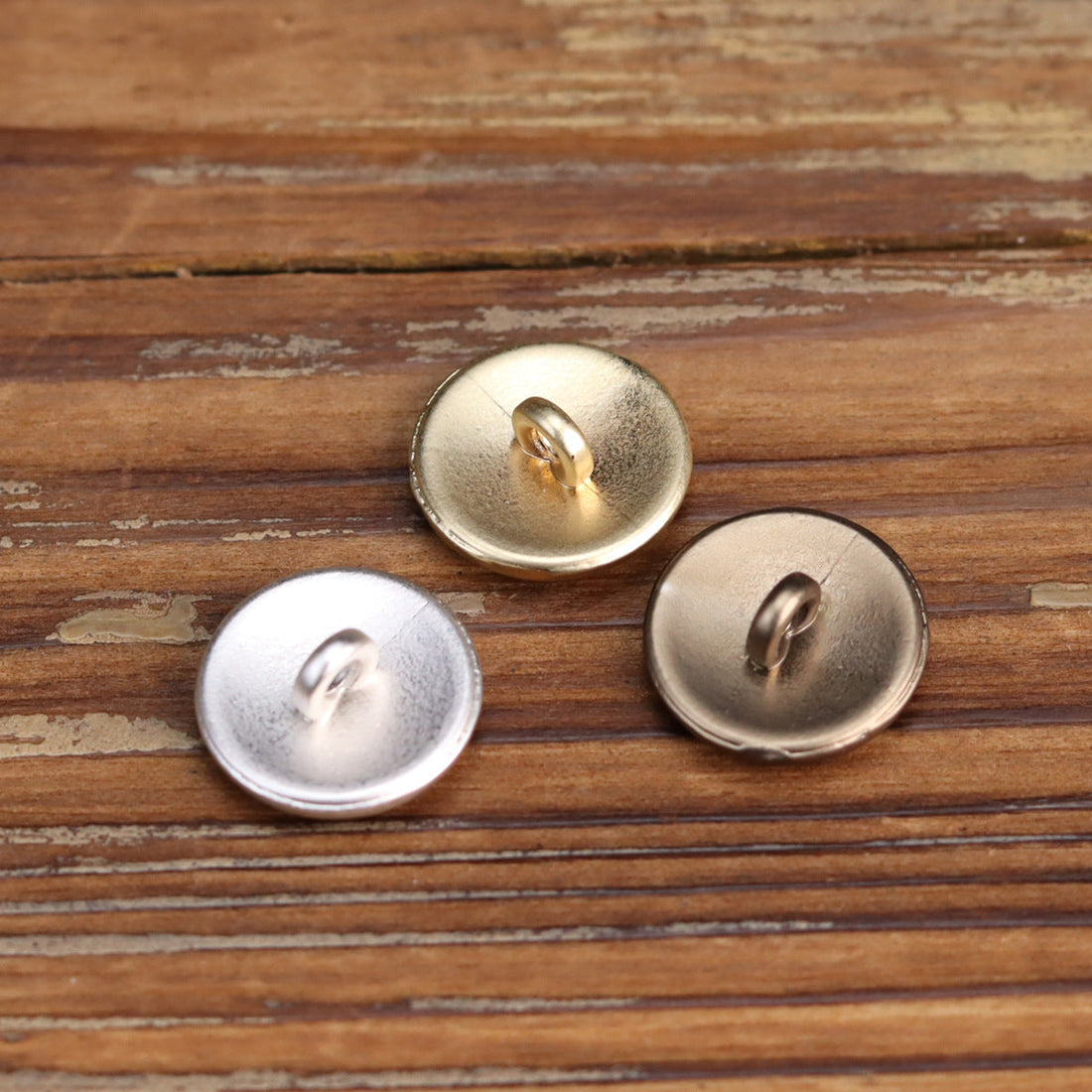 Round metal shank buttons with vintage wave embossing; silver and gold tones, 3-pack view.