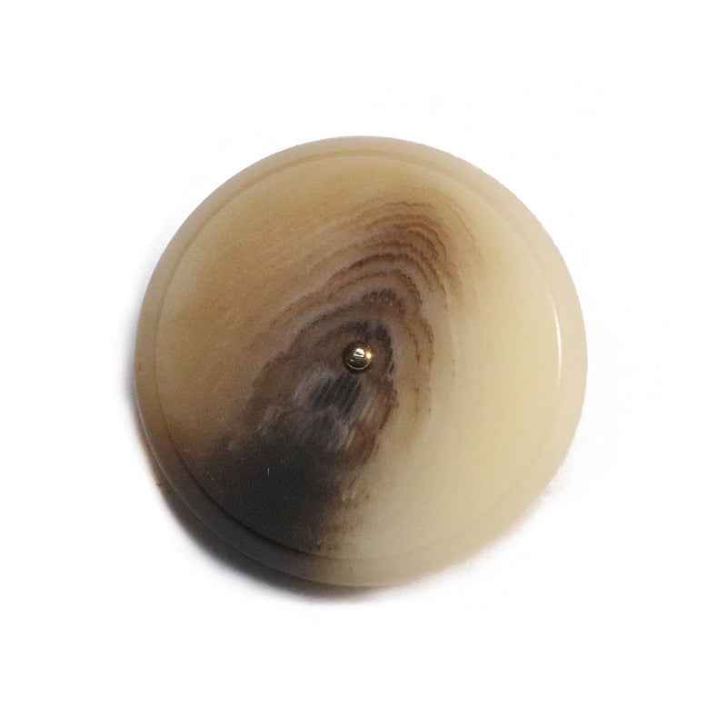 Khaki round resin button with flat face and metal shank, visible button post