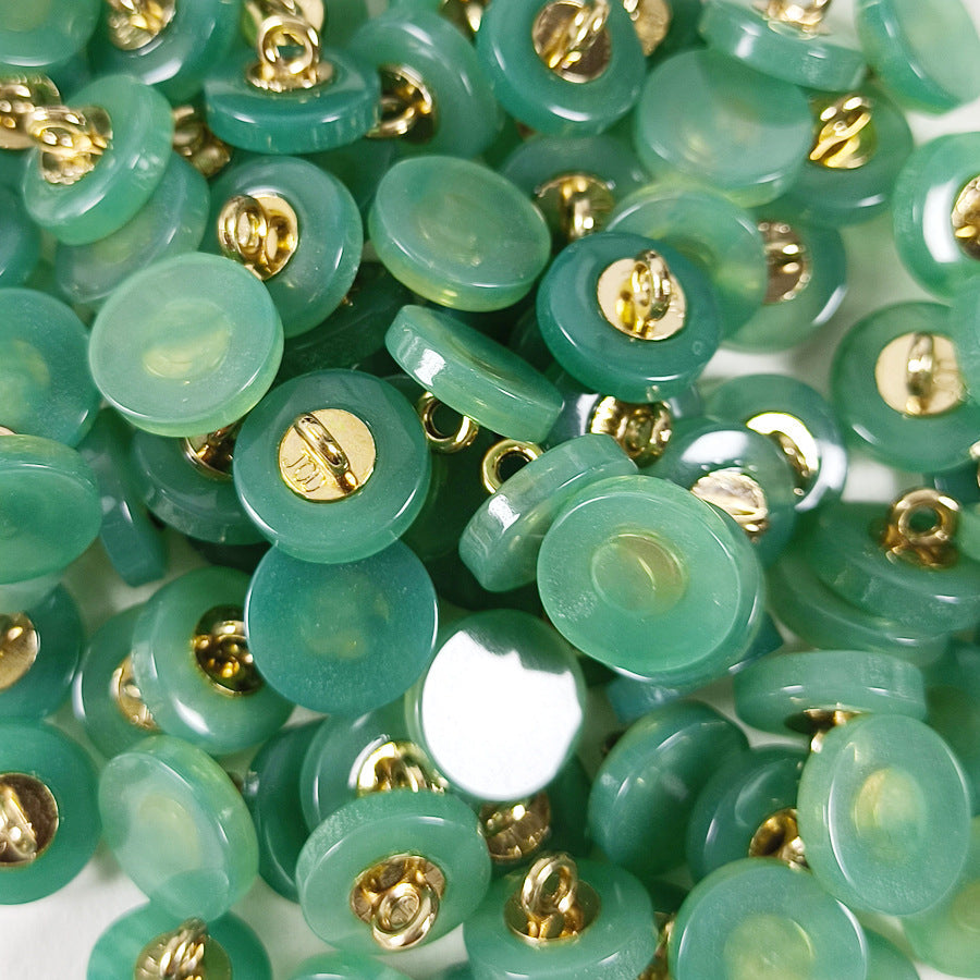 Faux agate resin shank buttons, teal discs with gold metal shanks