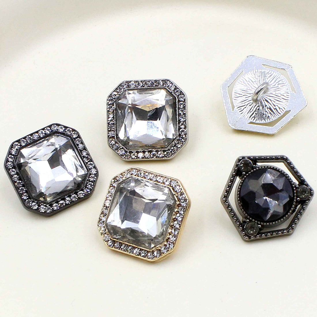 Square hexagon crystal buttons set with faceted center stones and rhinestone borders
