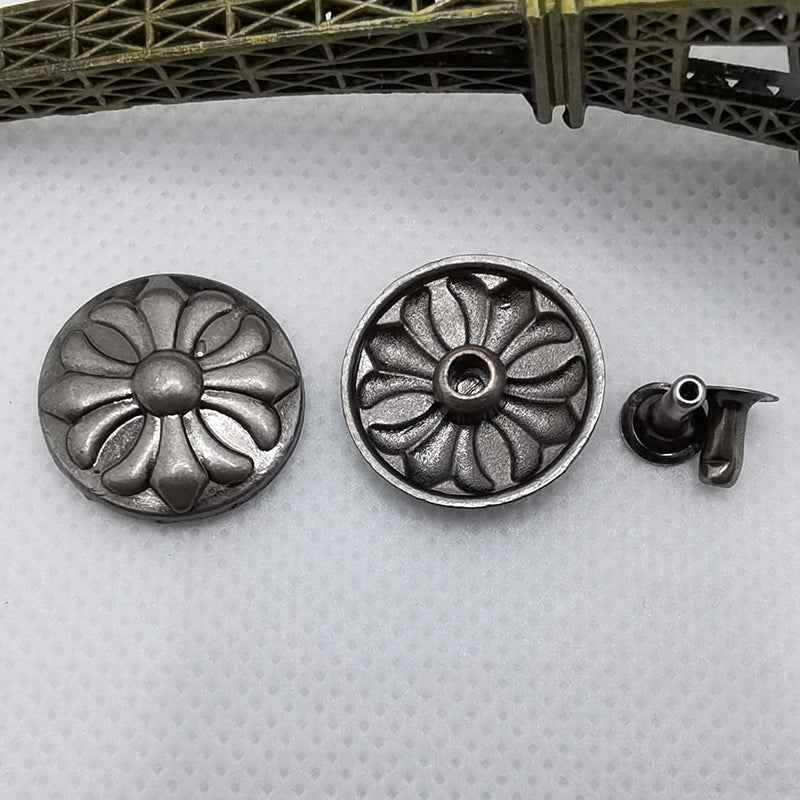 Vintage silver round rivet stud buttons with cross motifs, mix of disc and stud backs.