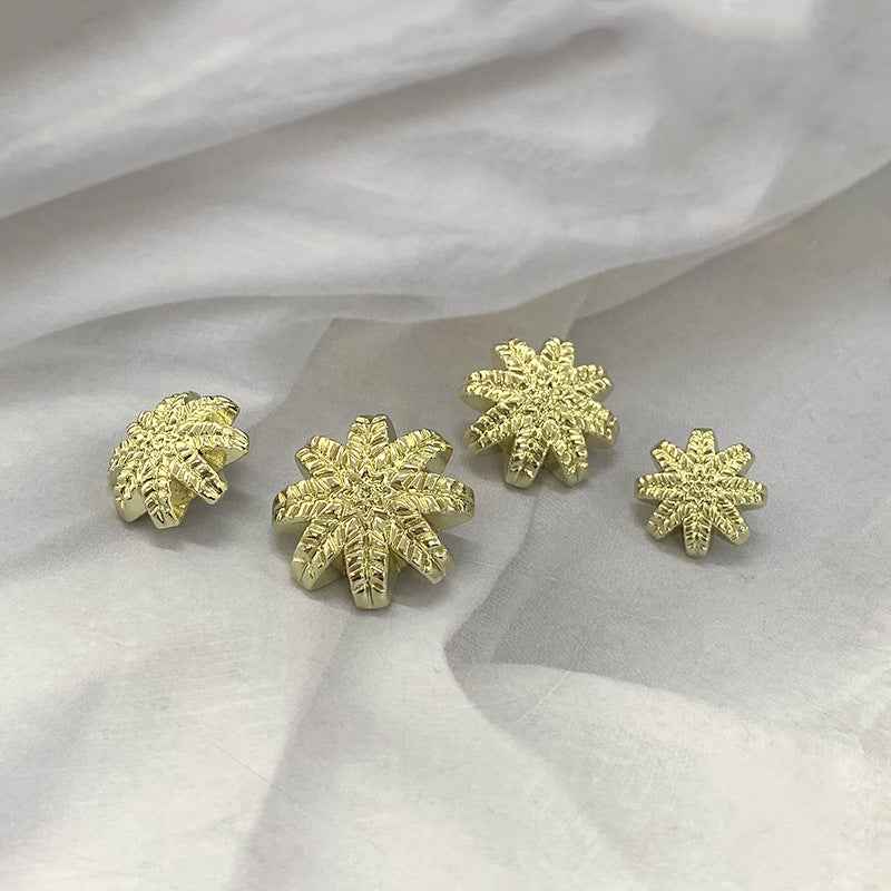 Gold Metal Leaf shank buttons, snowflake-style set of four