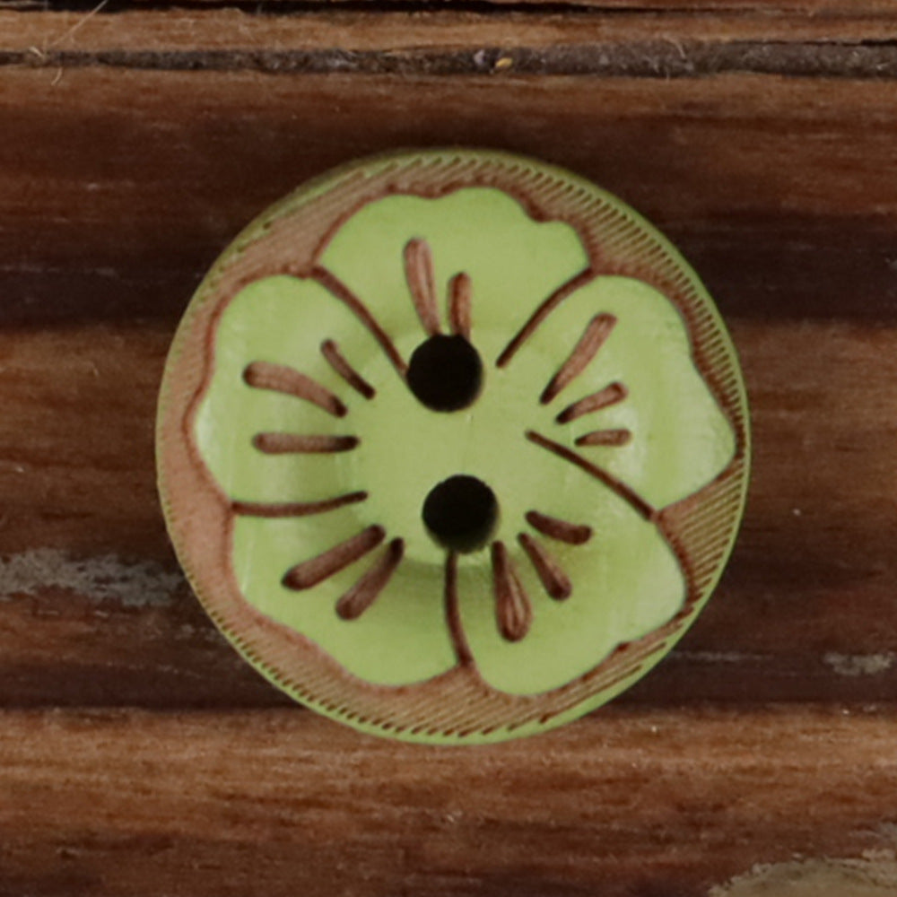 Round 2-hole wood button with painted floral pattern in light green and brown accents.