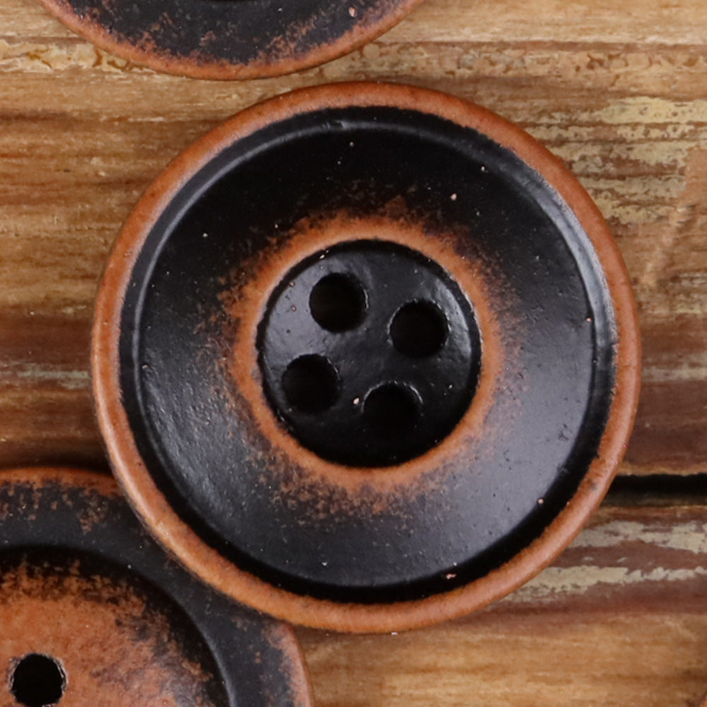 Round 4-hole double-ring button in dark red wood-tone, close-up
