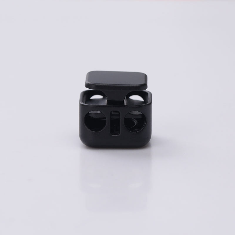 Square two-hole metal spring cord lock, cylindrical, black