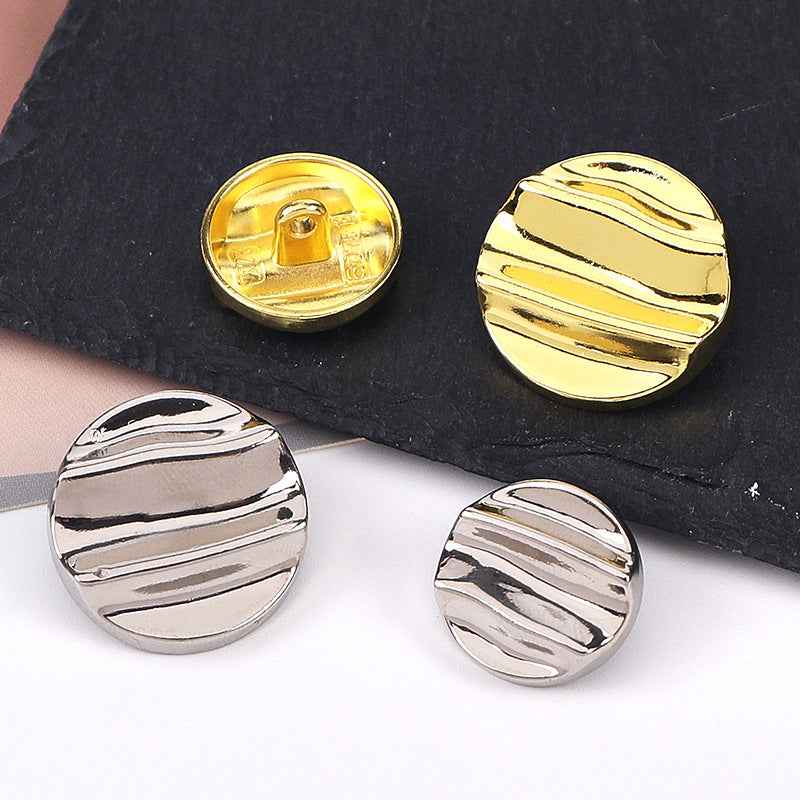 Gold and silver crinkle wave buttons with shank, front and back views