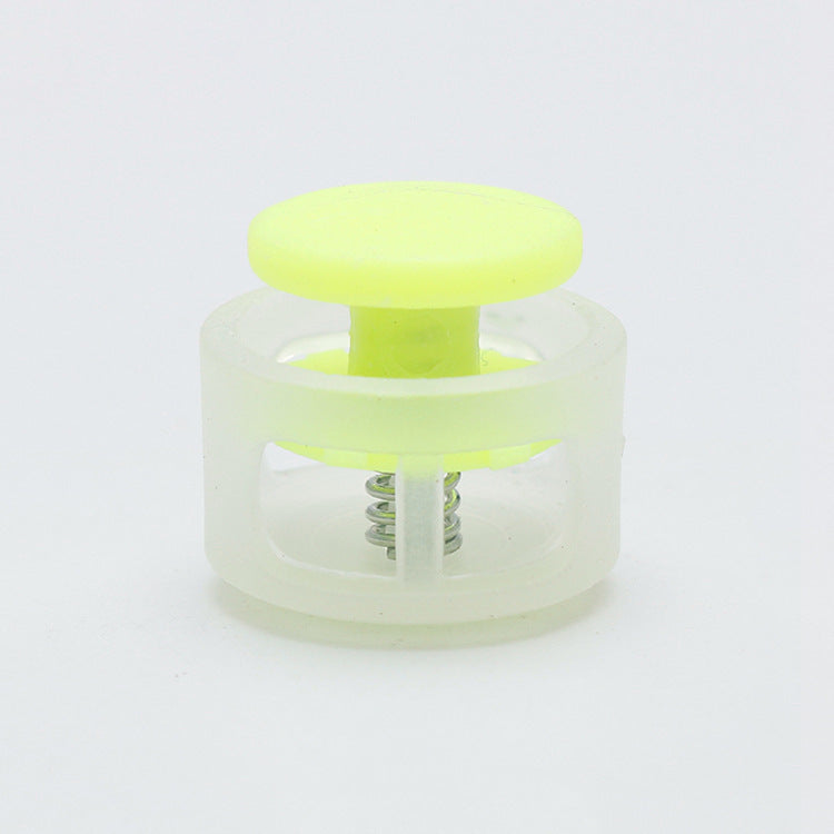 Yellow 17mm plastic cord lock toggle with spring stopper, clear base