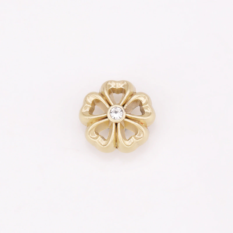 Sunflower rhinestone shank button, light gold metal with clear center gem