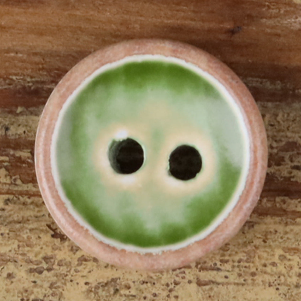 Round iridescent wood button, light green iridescence, two holes