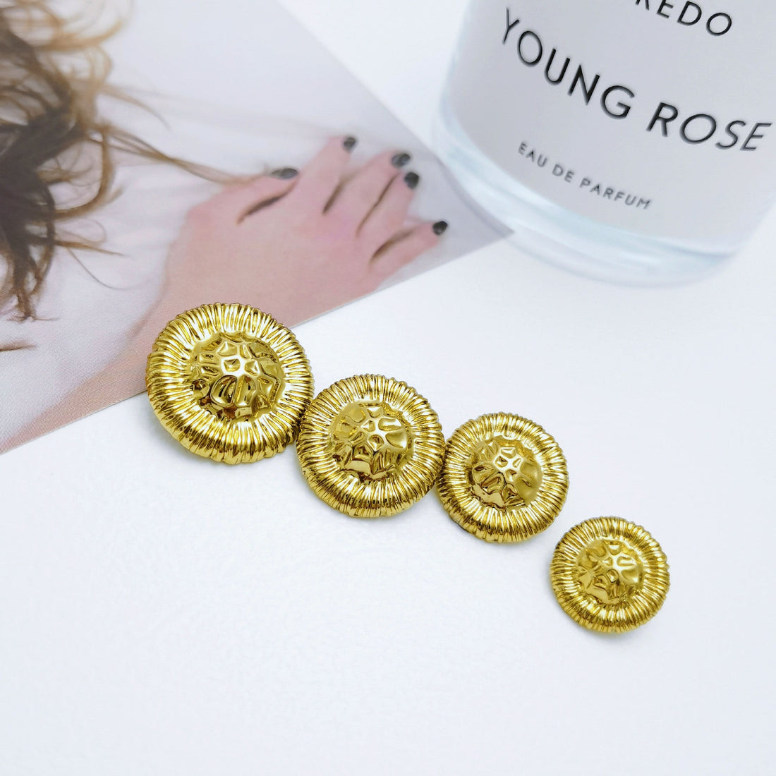 Irregular convex gold metal shank buttons, front view, 5 pcs