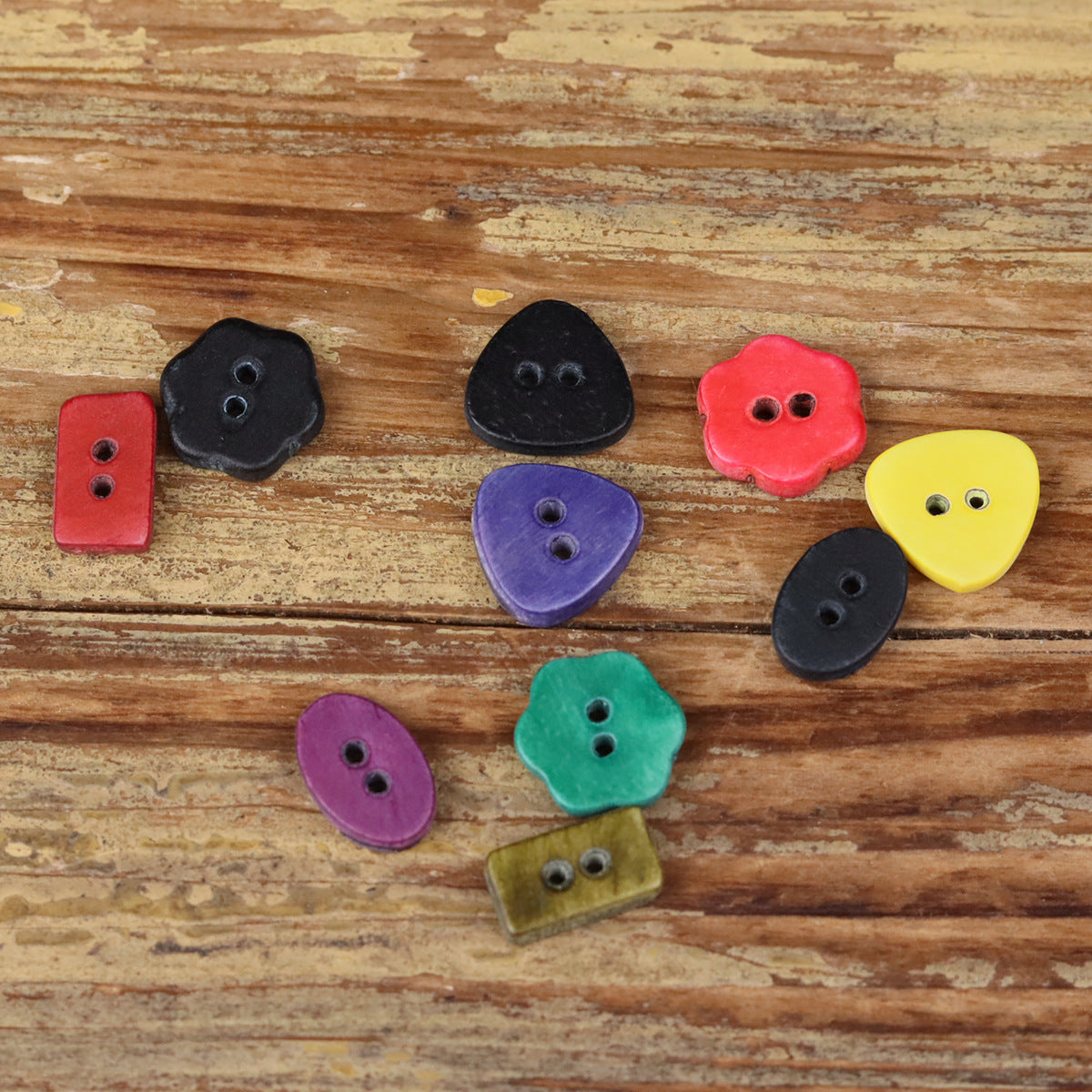 Novelty shaped shirt buttons in mixed colors, each with two holes