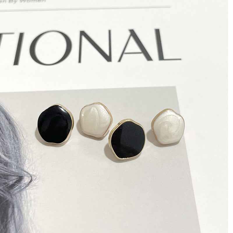 Set of 10mm metal shank buttons: black and white fronts with gold edging