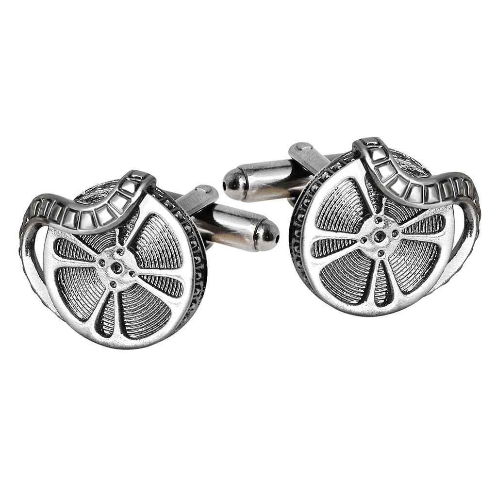 Vintage film projector cufflinks in antique silver, round reels with textured fan blades
