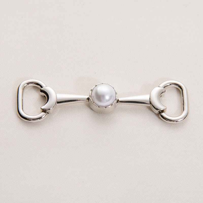 Silver shoe buckle chain with pearl decorative center and heart-shaped loop ends
