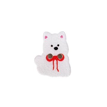 White puppy dog resin button with red bow and black face, single piece