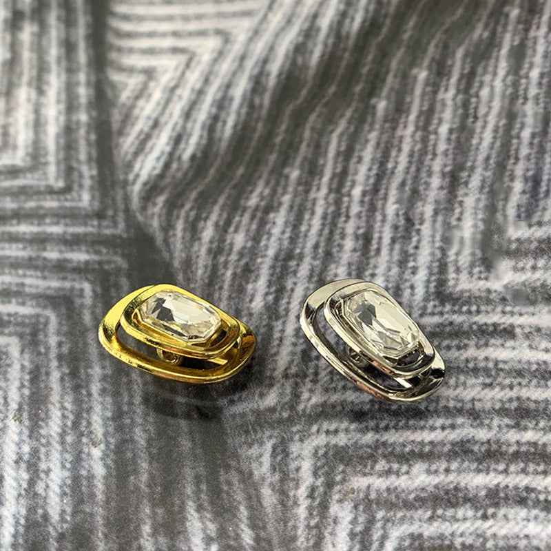 Gemstone shank buttons, gold and silver fronts with clear faceted octagon, angled pair
