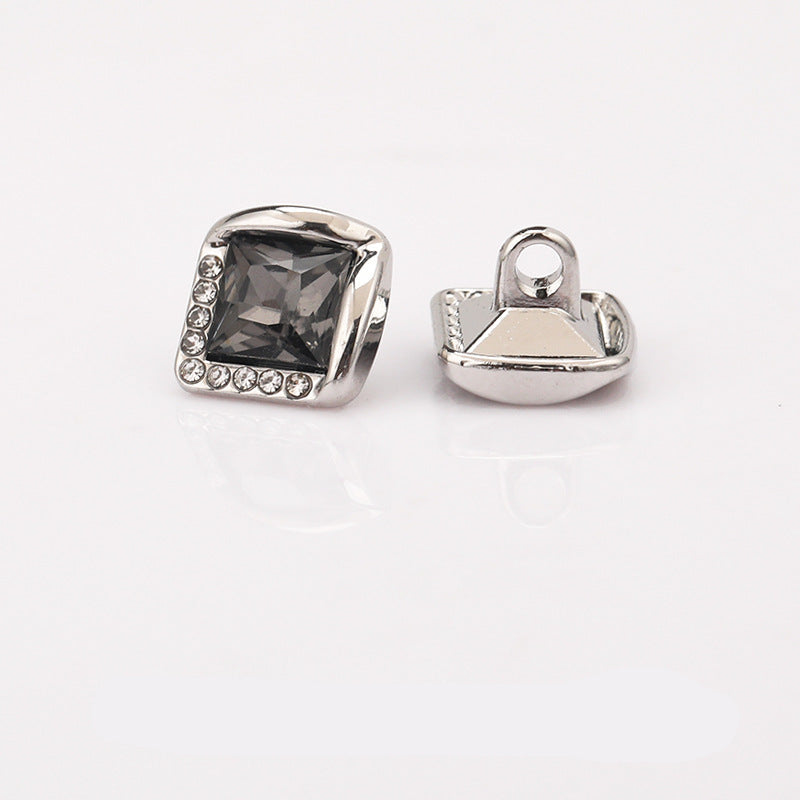 Silver square rhinestone shank button with dark faceted stone and crystal trim