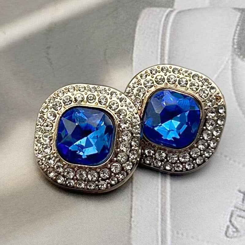Shank buttons with blue square-cut faceted gems in silver-tone round settings (2 pcs)