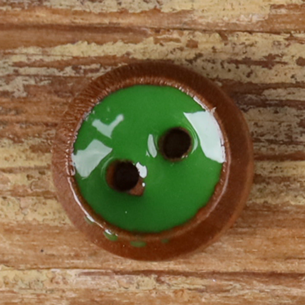 Round 2-hole wood shirt button with green front and natural brown rim