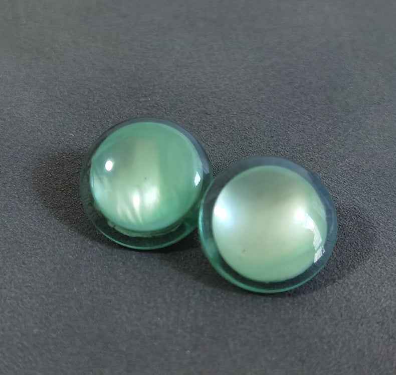 Domed resin shank buttons in light green and mint green