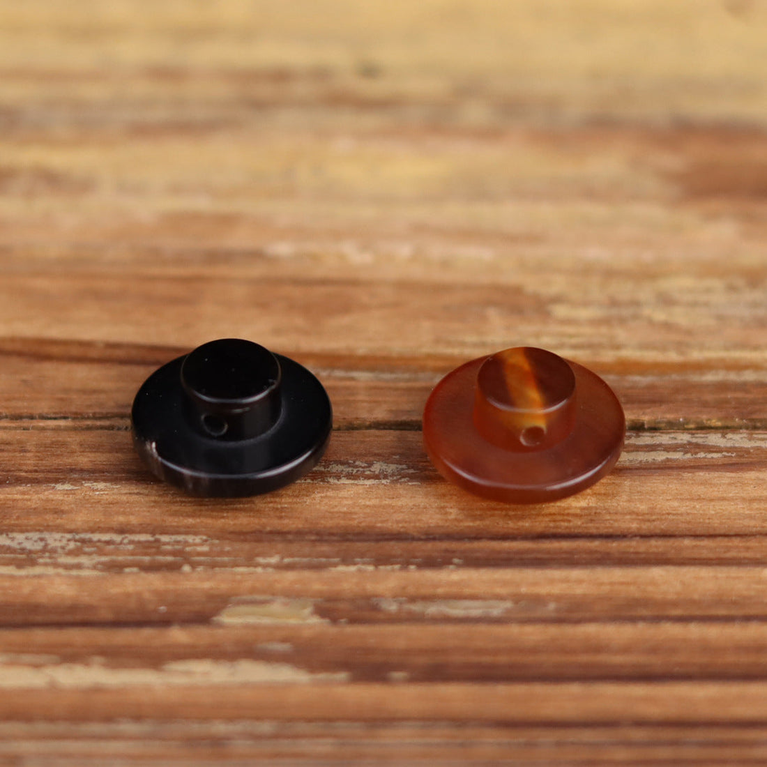Round horn buttons, dark brown and black, smooth domed fronts with natural sheen