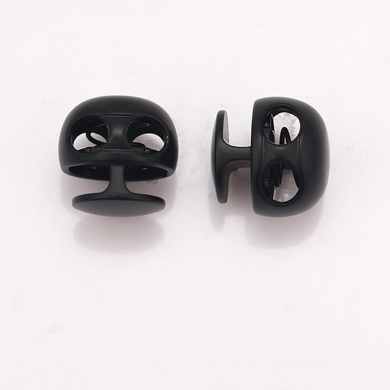 Black ball-shaped metal spring toggle stopper, front and back clips shown