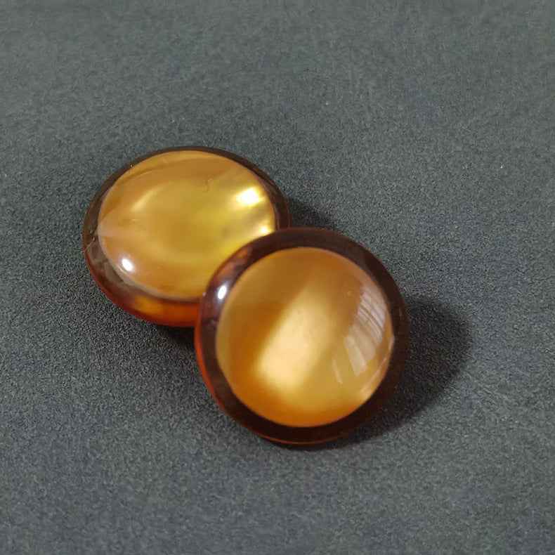 Domed resin shank buttons in gold and amber with dark brown edging