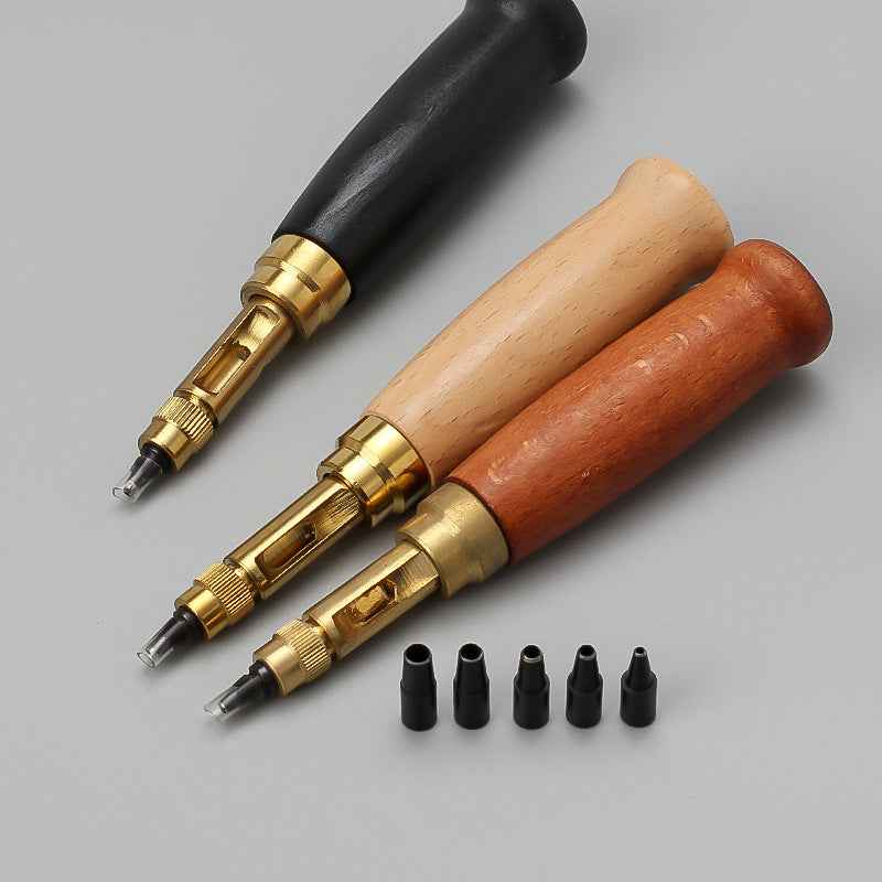 Leather belt hole punch tool set with black, brown, and wood handles plus punch tips