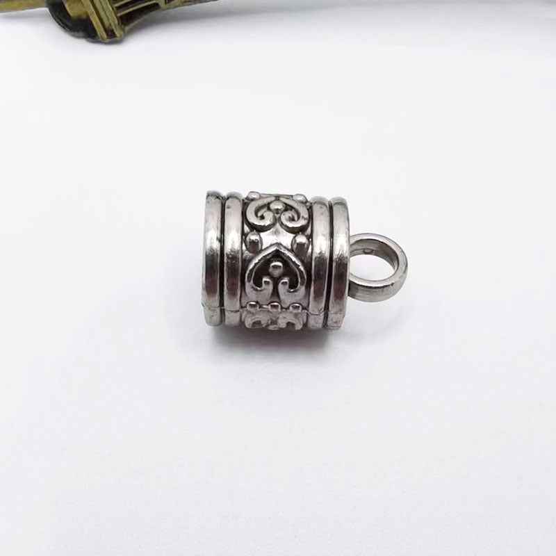 Silver antique cylinder bell cord end cap with swirl engraving and loop ring