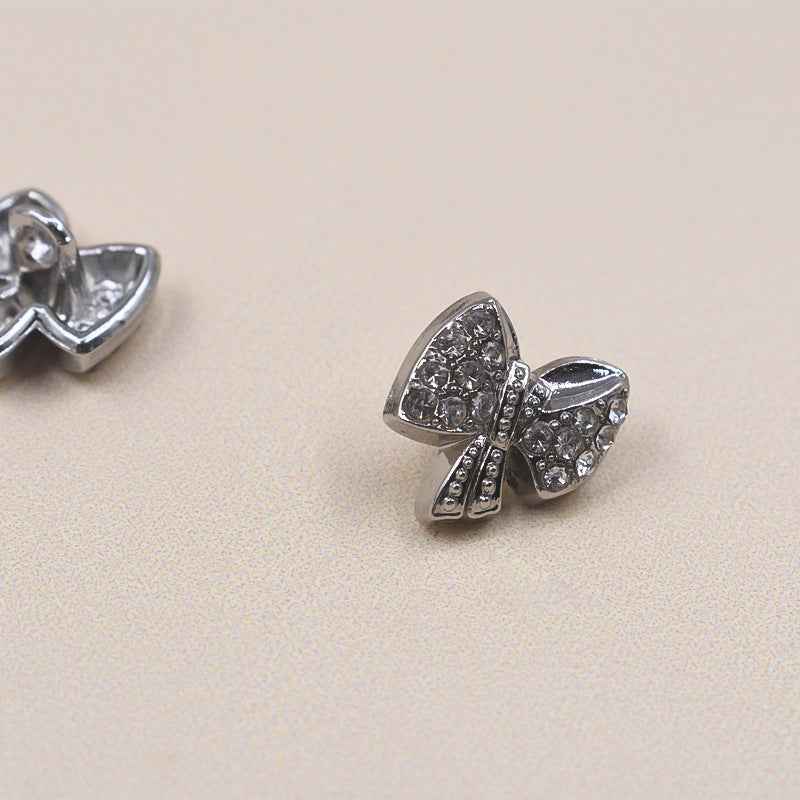11.5mm Bow rhinestone shirt button, silver metal, heart-center detail