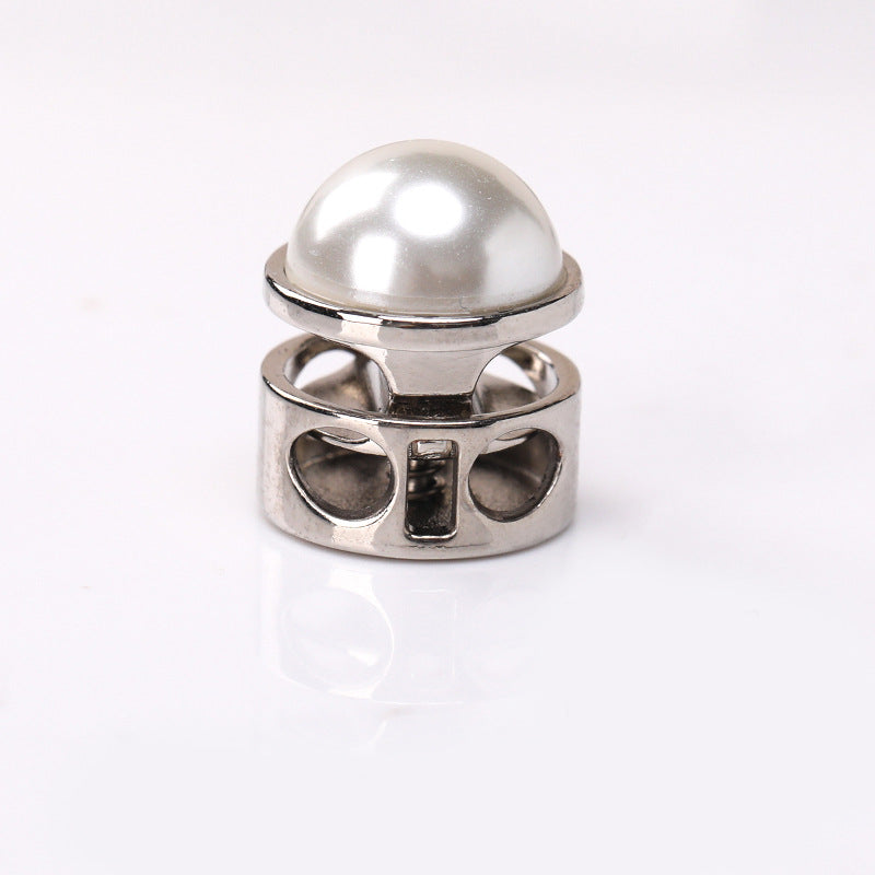 Silver two-hole cord lock with pearl dome top and spring cylinder metal drawstring fastener