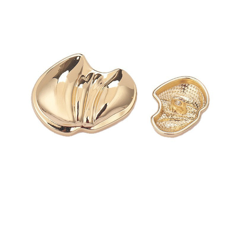 Paw-shaped metal shank button, light gold finish, reflective front