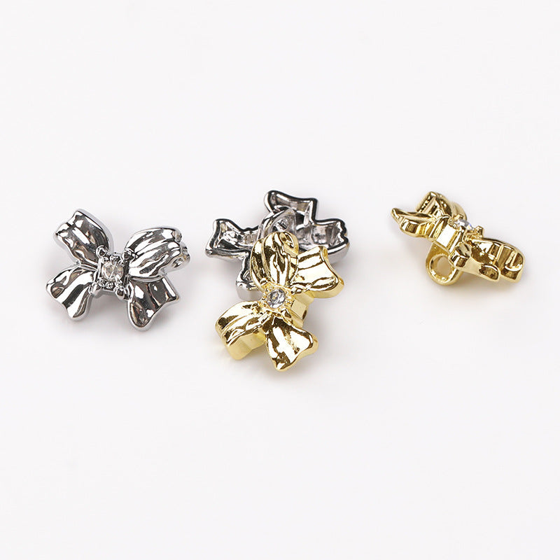 Crystal bow metal shank buttons, light gold and nickel silver pair