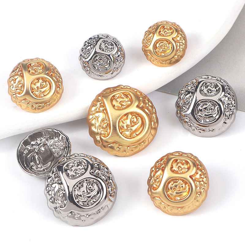 Gold domed letter B metal shank button, embossed ornamental crest