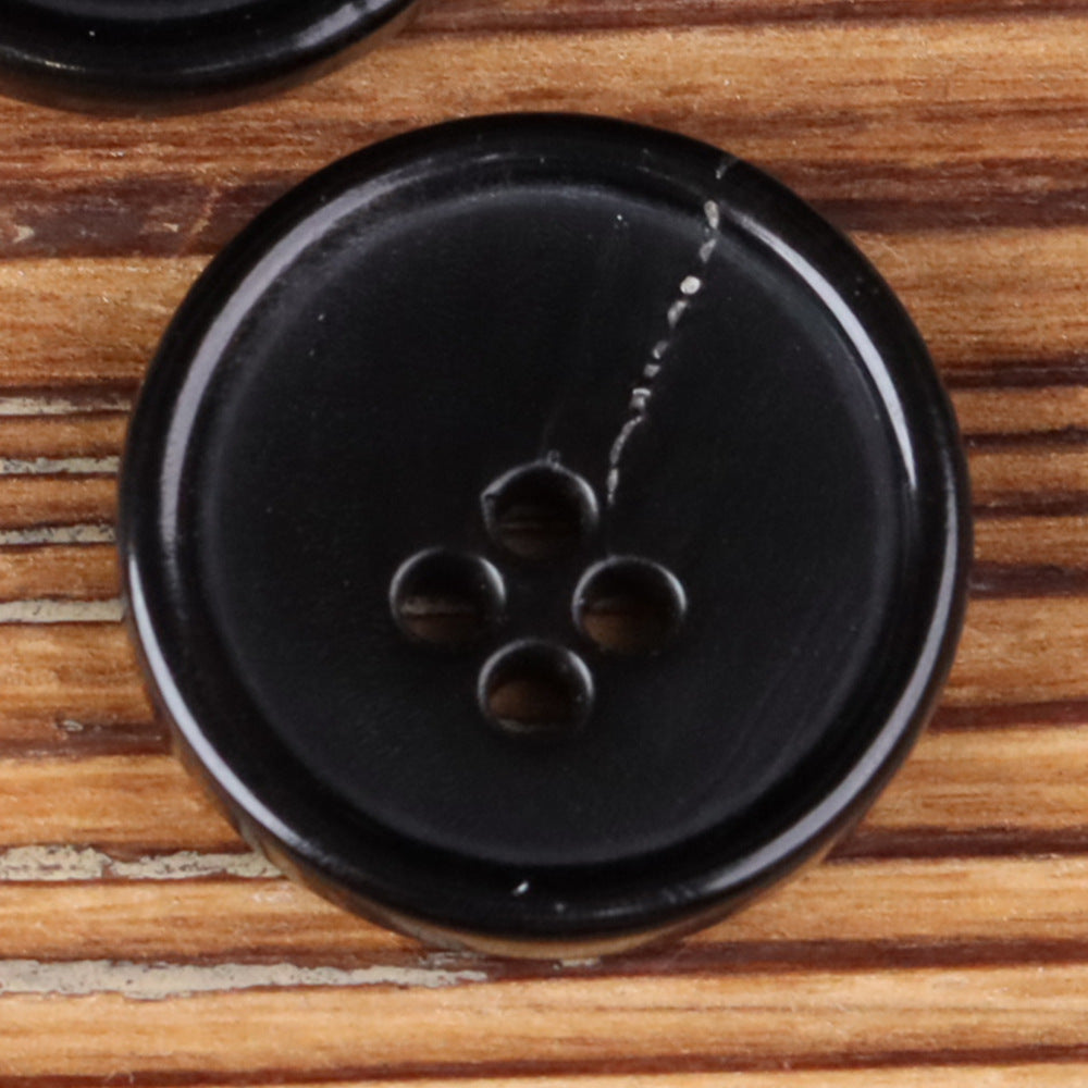 Black 4-hole round button with detailed hole layout