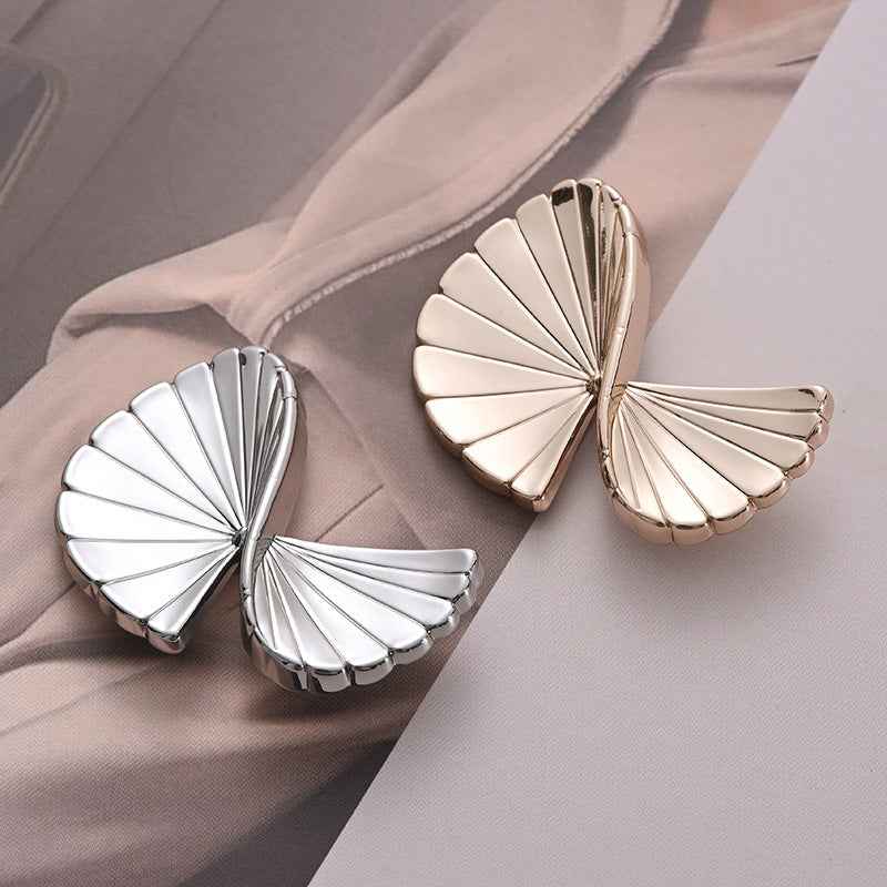 Fan-shaped folded metal buttons, silver and gold, geometric ridges