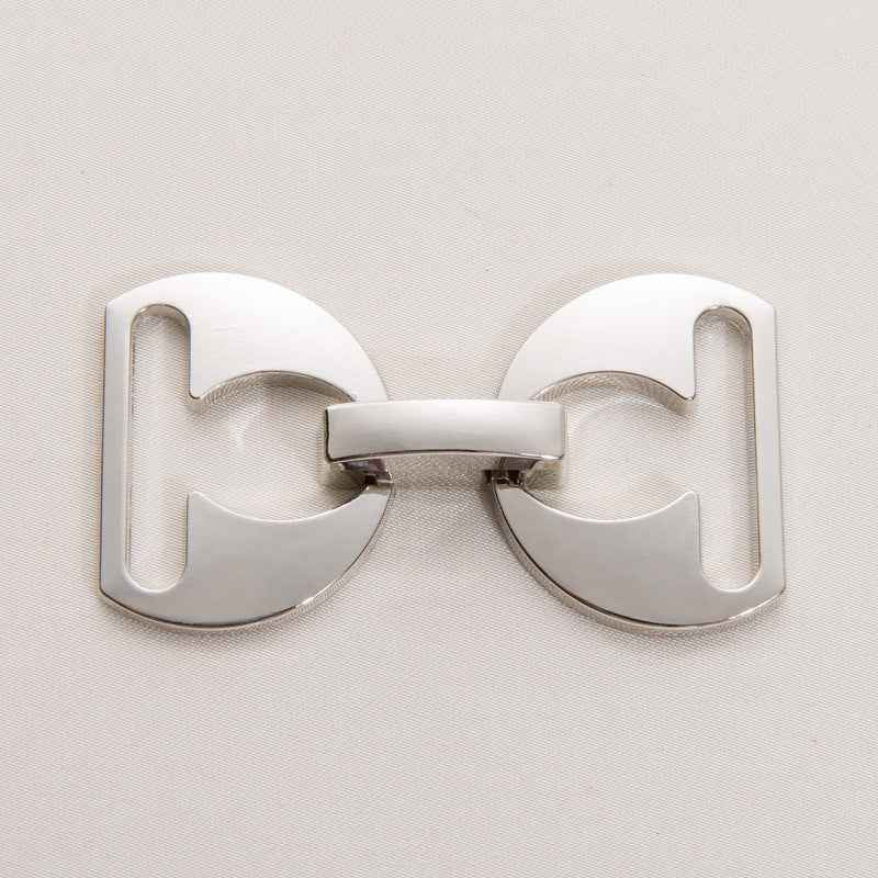Gold detachable metal belt buckle clasp with curved U-frame and central snap bar