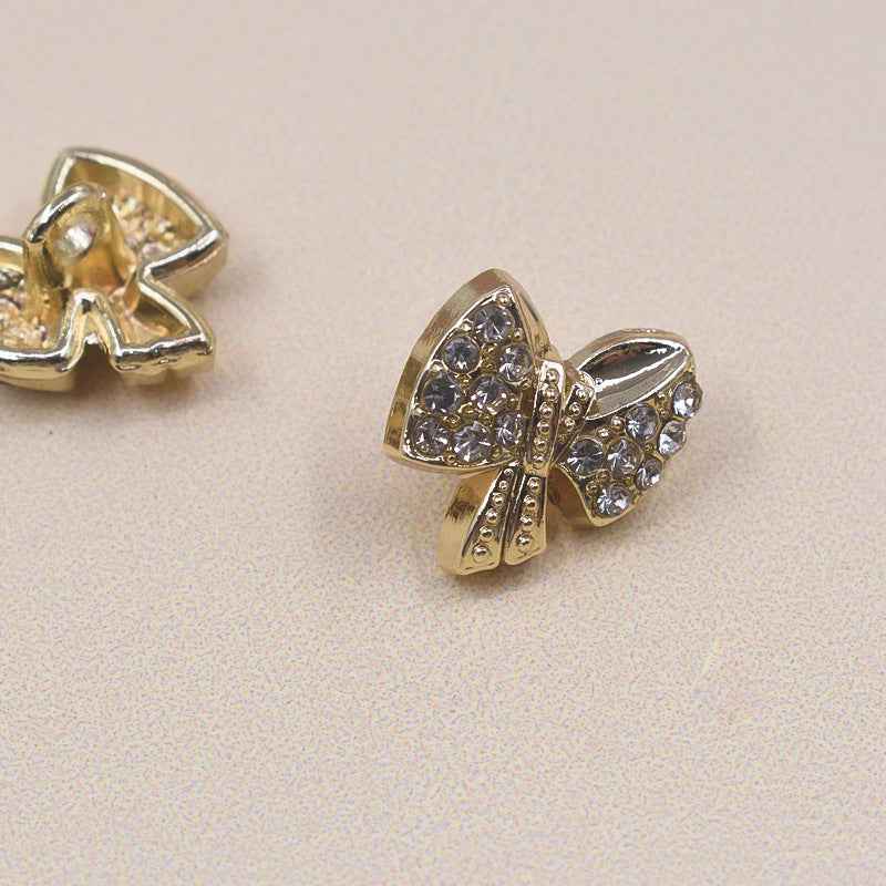 11.5mm Bow rhinestone shirt button, silver metal, heart-center detail