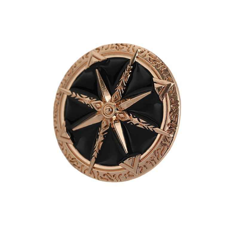Vintage star brooch, rose-gold 8-point design with black enamel panels