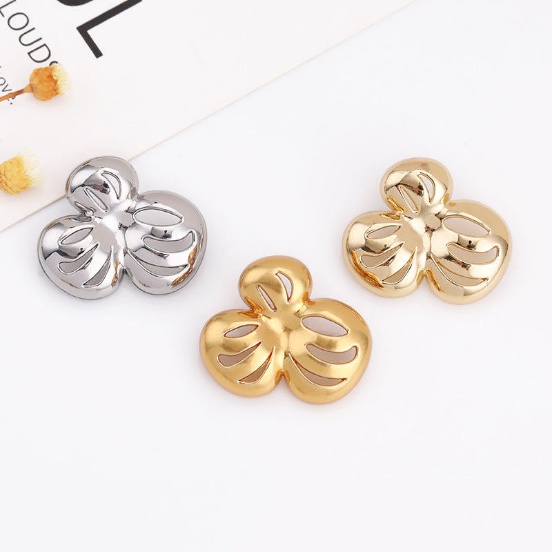 Mixed hollow flower metal shank buttons, gold and silver tones with flat backs