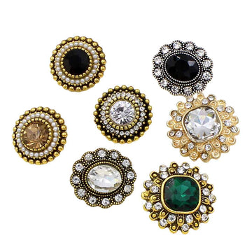 Antique gold oval shank button with pearl border and black center crystal